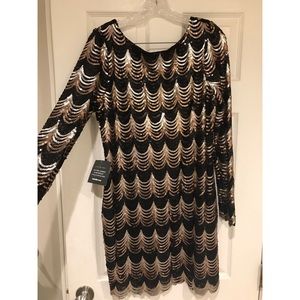 Black and gold sequin long sleeve scalloped dress